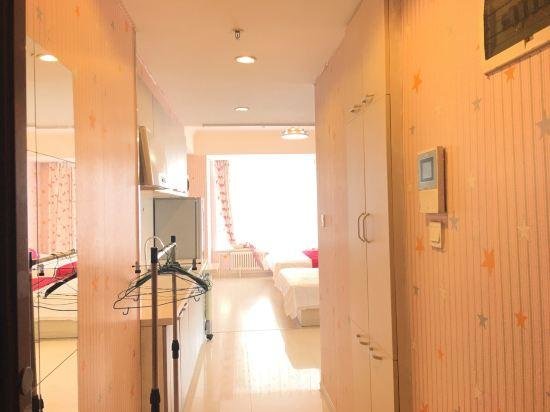 Cama en dormitorio compartido Dalian Meijiahua Apartment