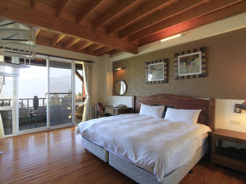 Кровать в общем номере дуплекс Ailiga Travel Villa