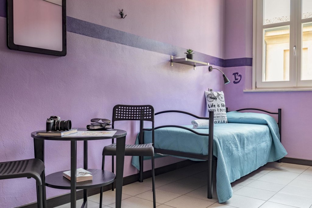 Cama en dormitorio compartido (dormitorio compartido femenino) Ostello San Filippo Neri