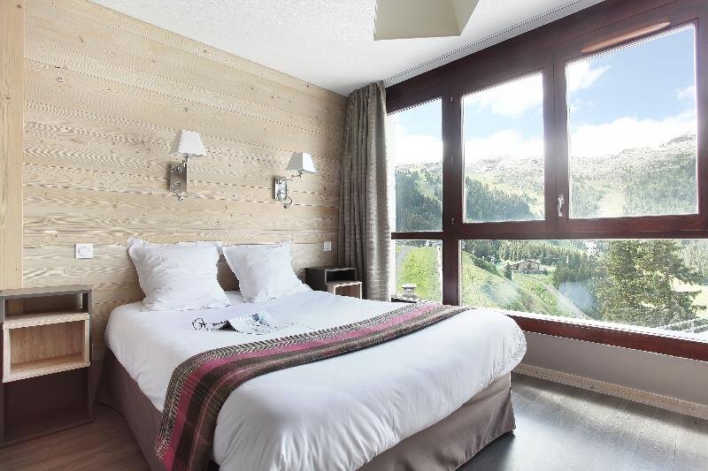 Cama en dormitorio compartido 2 dormitorios con balcón Résidence Odalys Le Panoramic