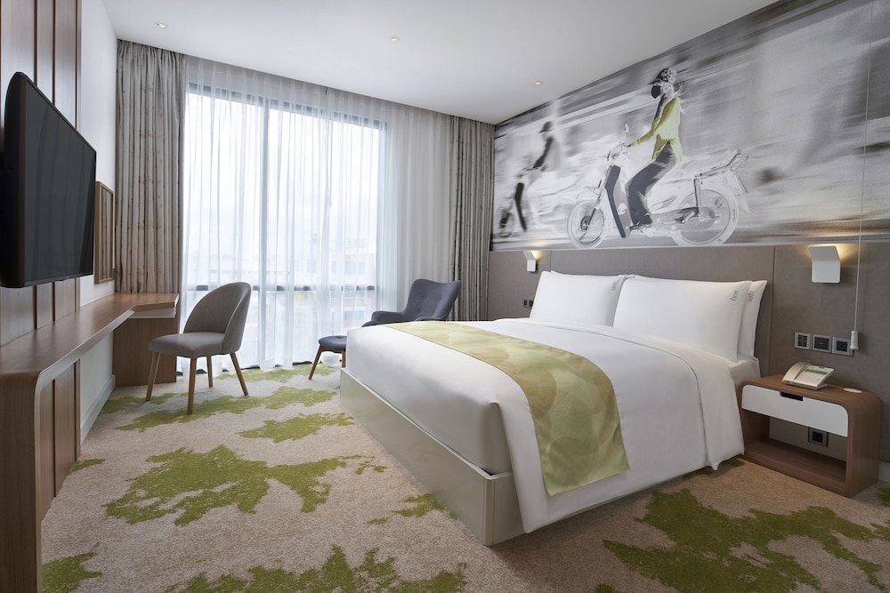 Suite 1 camera da letto Holiday Inn & Suites Saigon Airport, an IHG Hotel