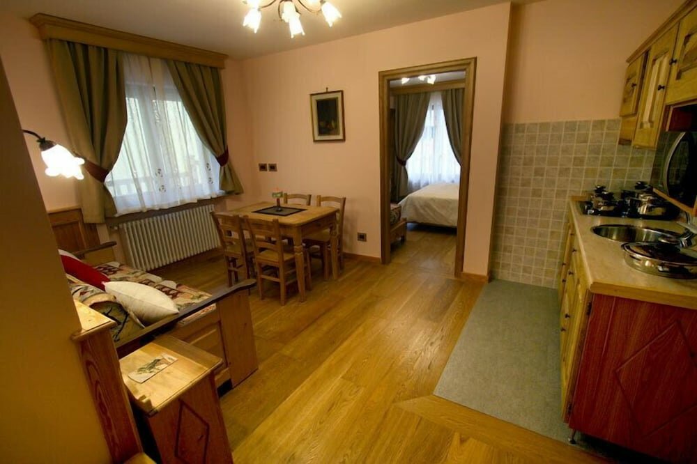 Suite familiar 2 dormitorios con balcón Villa Giuditta Residence