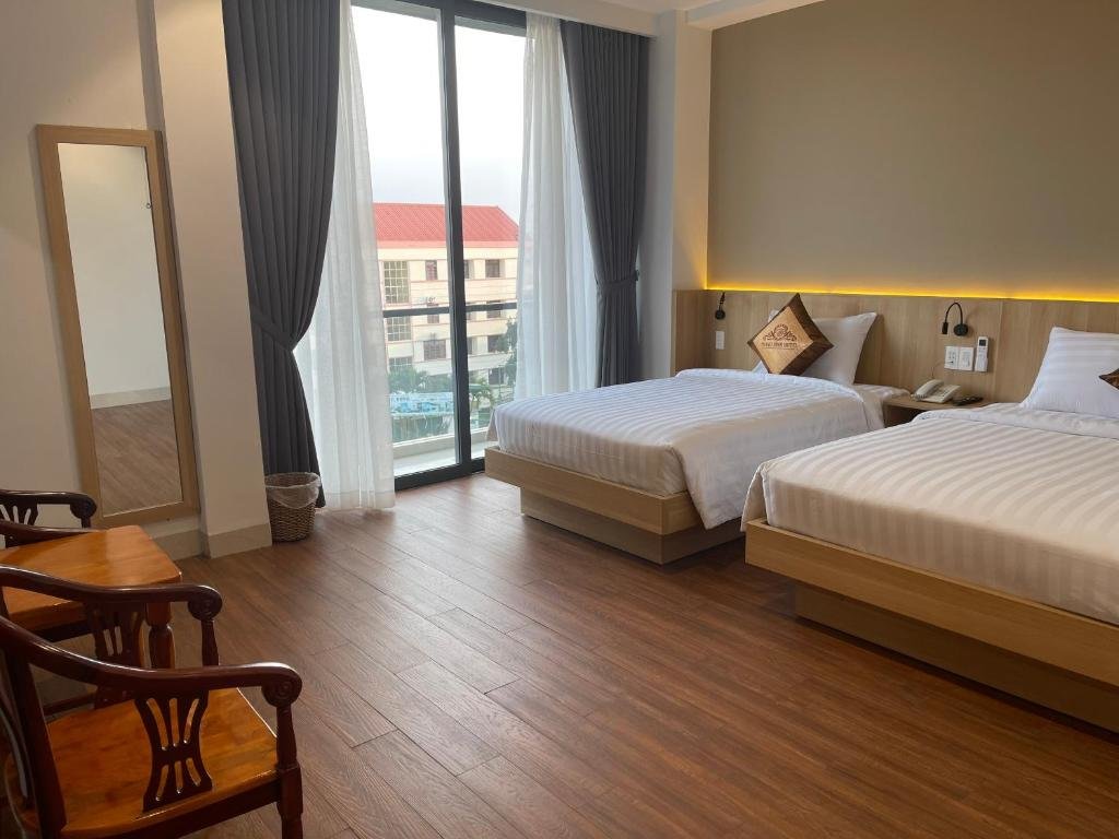 Кровать в общем номере Thanh Bình Hotel - 47 Y Bih - BMT