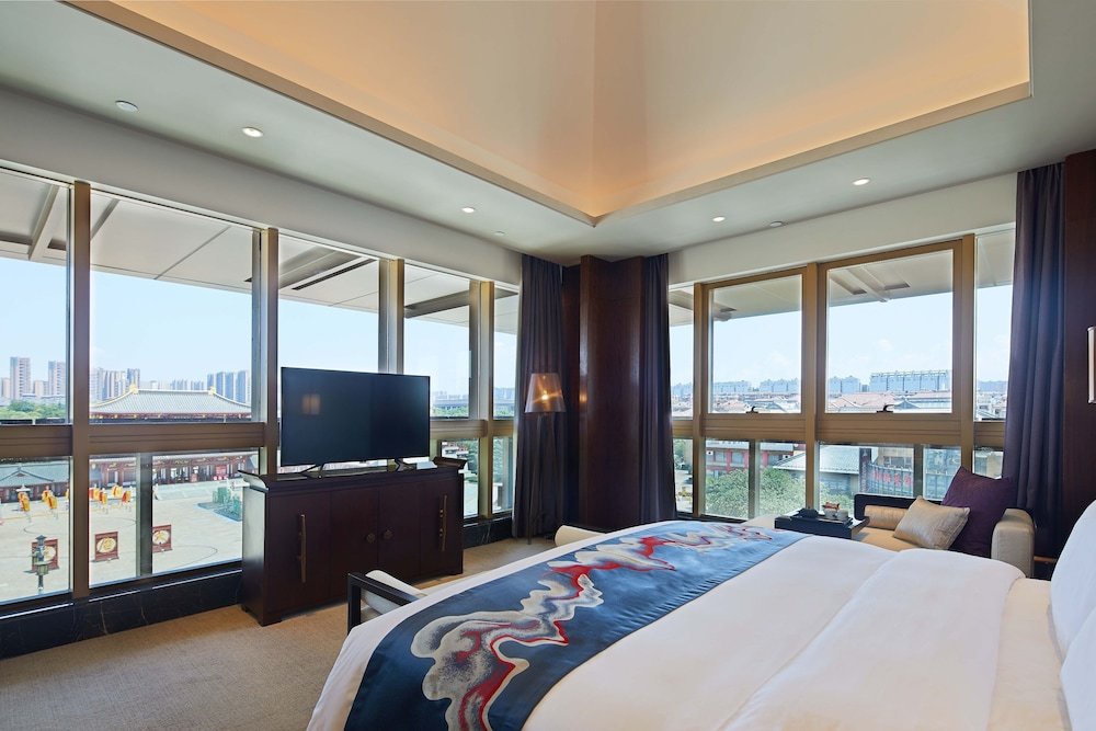Suite 1 Schlafzimmer mit Seeblick Fu Rong Ge Hotel