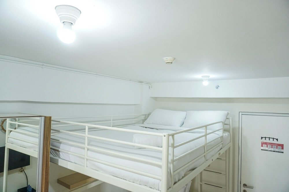Номер Standard Compact and Scenic Studio Room Green Bay Pluit Apartment