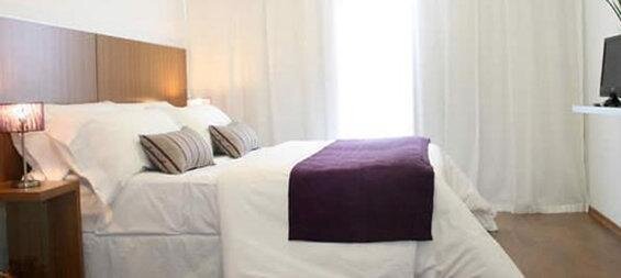 Кровать в общем номере Hotel Bys Palermo