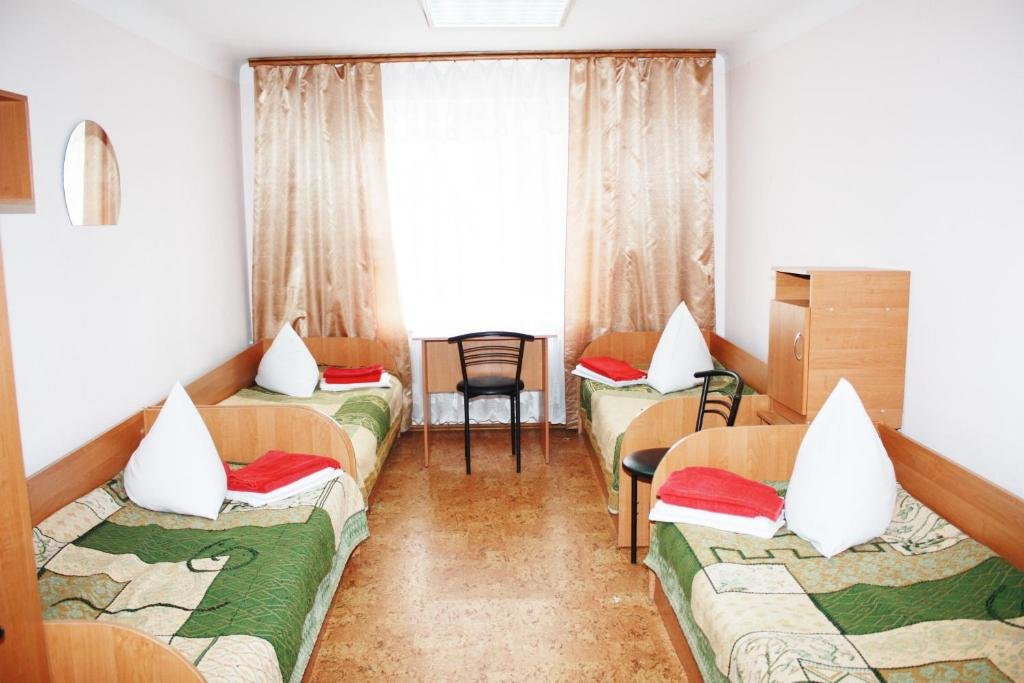 Кровать в общем номере Отель Выдубичи