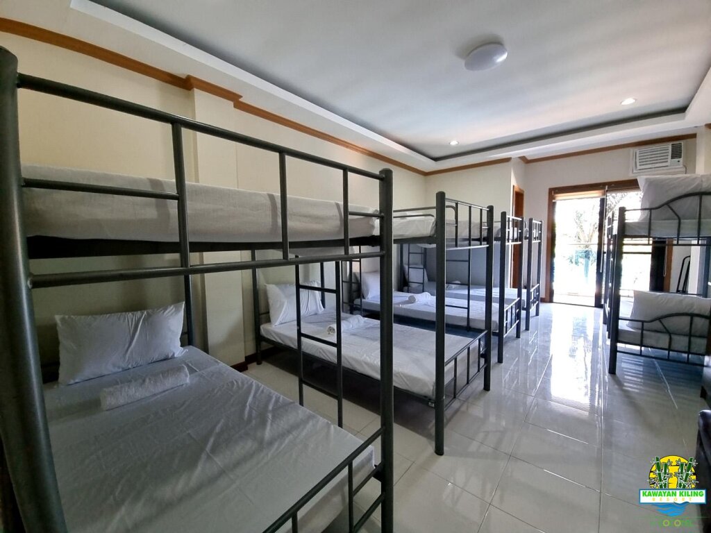 Bett im Wohnheim Kawayan Kiling Resort by Cocotel