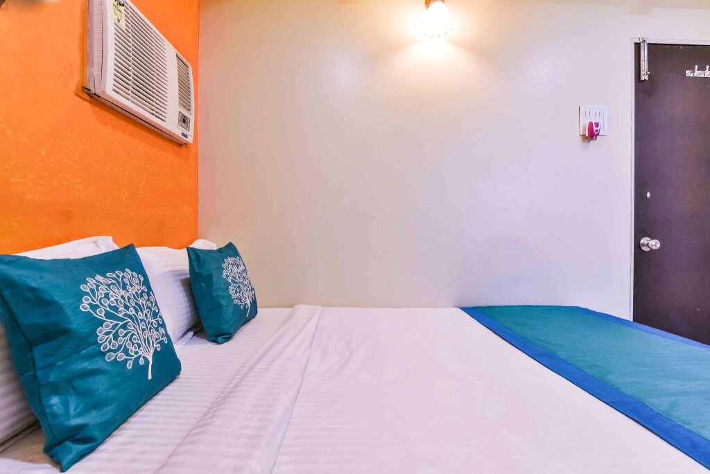 Кровать в общем номере Hotel New Shree Niwas