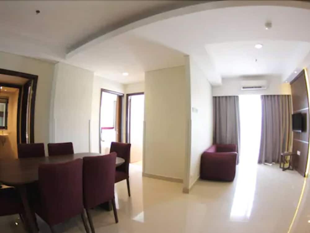 Люкс с балконом MG Suites Maven Semarang