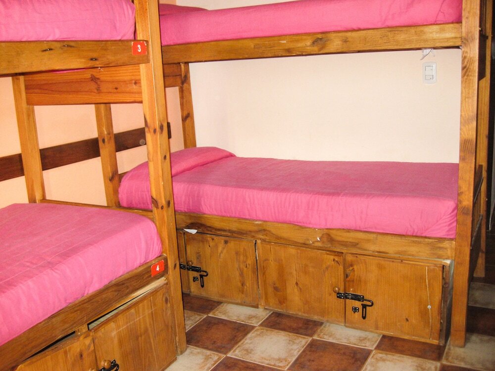 Кровать в общем номере Hostel Inn Calafate