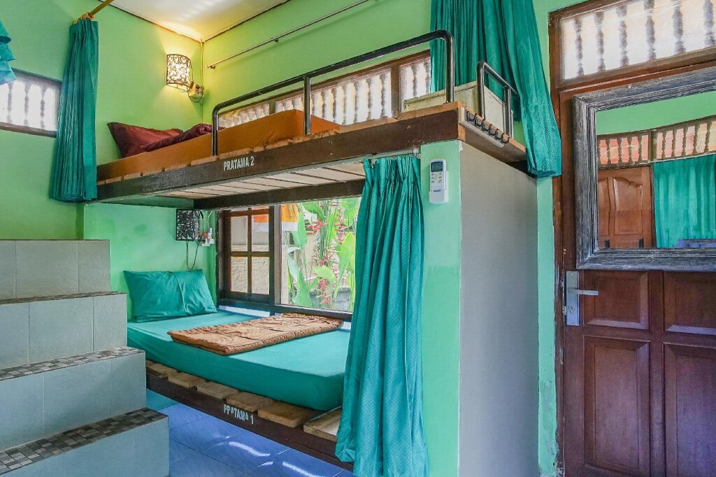 Кровать в общем номере Padi-Padi Hostel & Bar