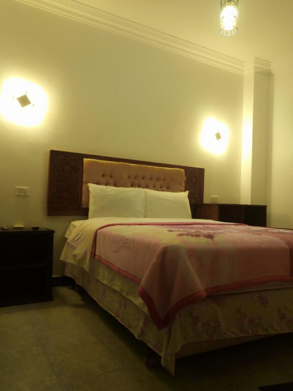 Кровать в общем номере Arabian Nights Hostel