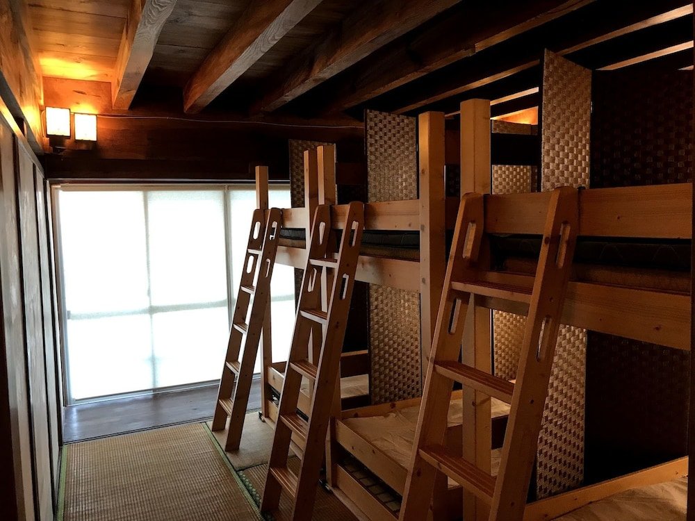 Кровать в общем номере (мужской номер) с видом на море Guesthouse Wasabi