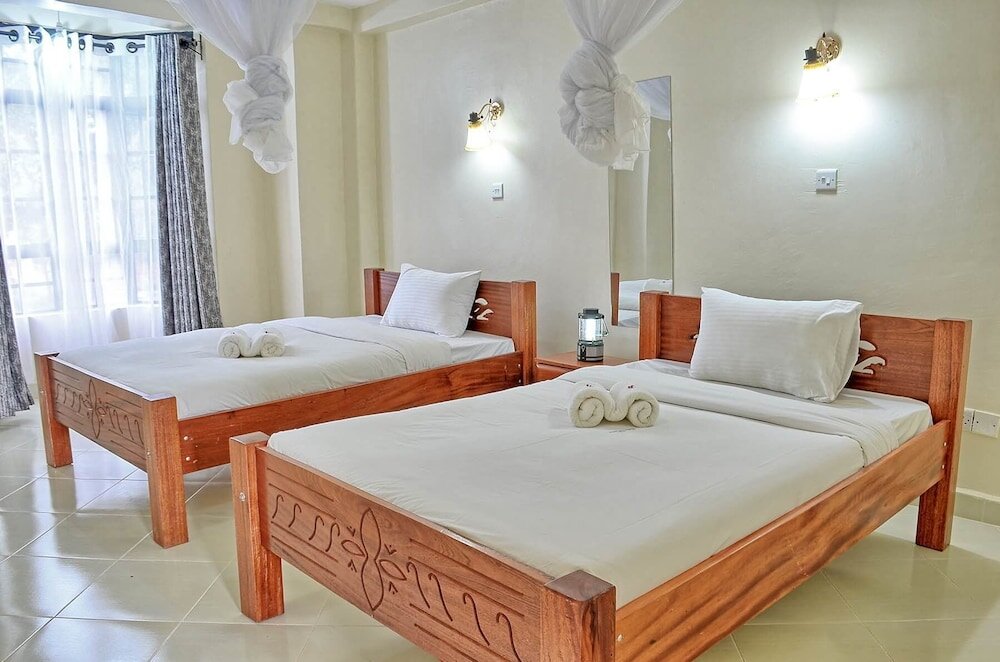 Standard Quadruple room Itibo Resort