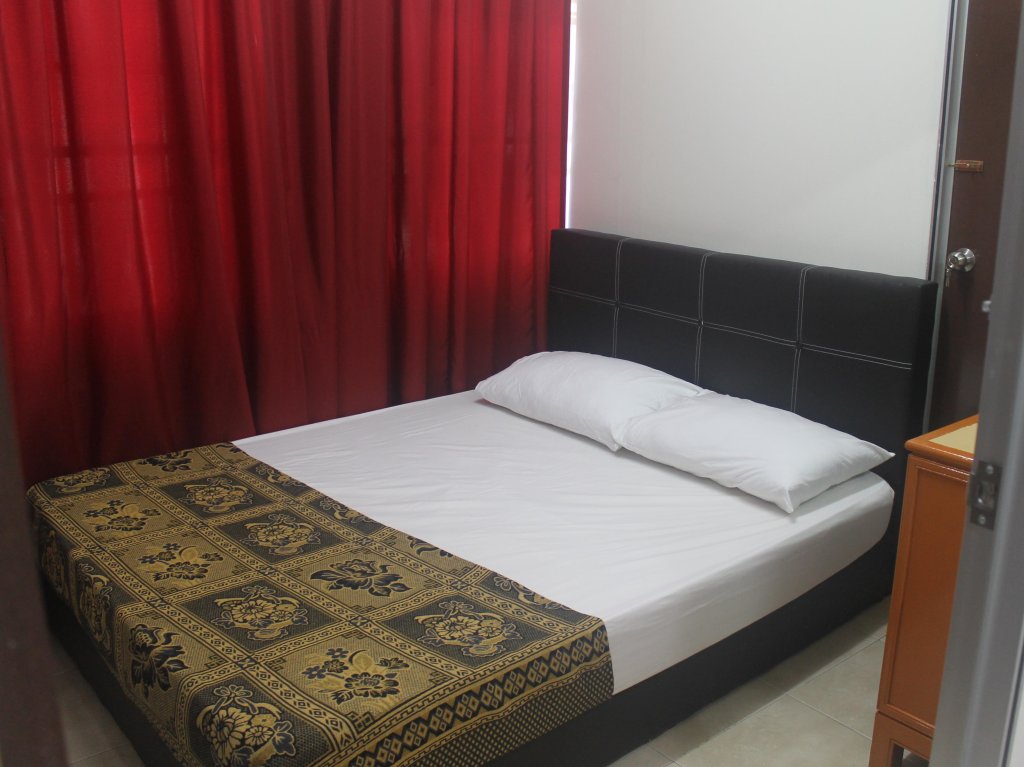 Cama en dormitorio compartido Ros Heritage Motel