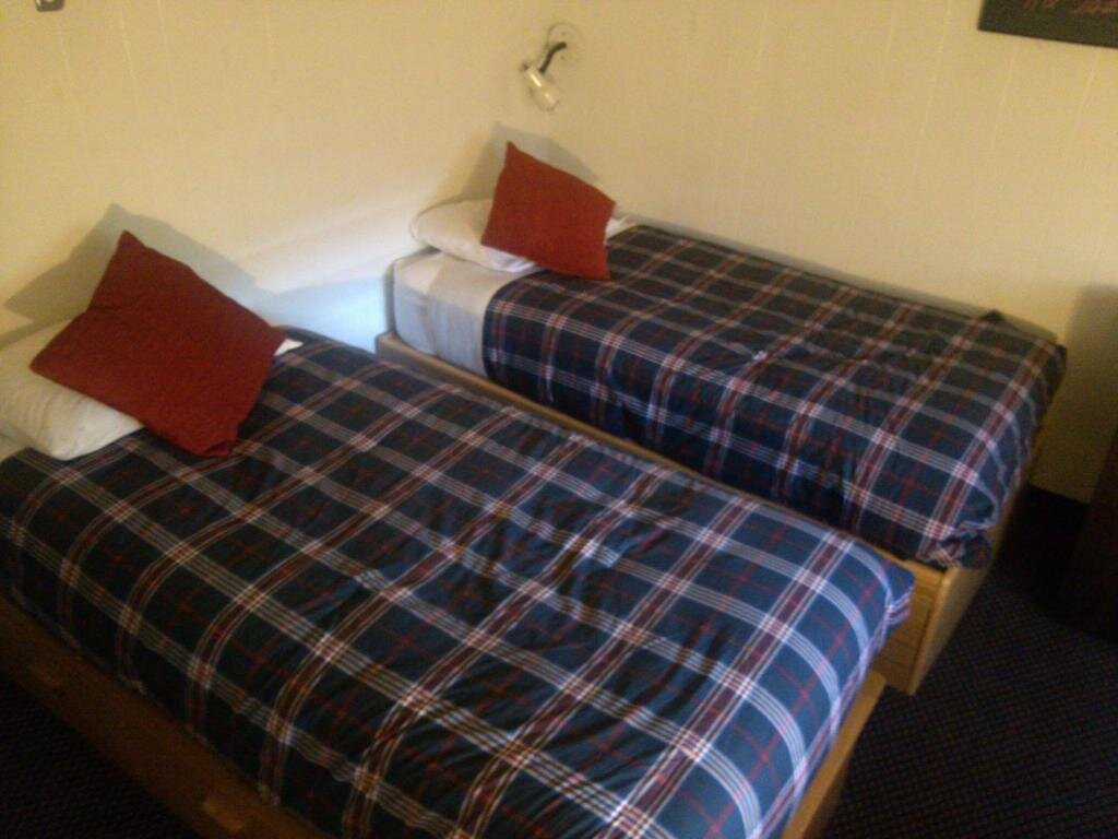 Кровать в общем номере St Moritz Lodge and Condominiums