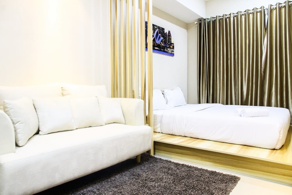Standard room Modern Style The Oasis Studio Apartment with Comfortable Sofa
