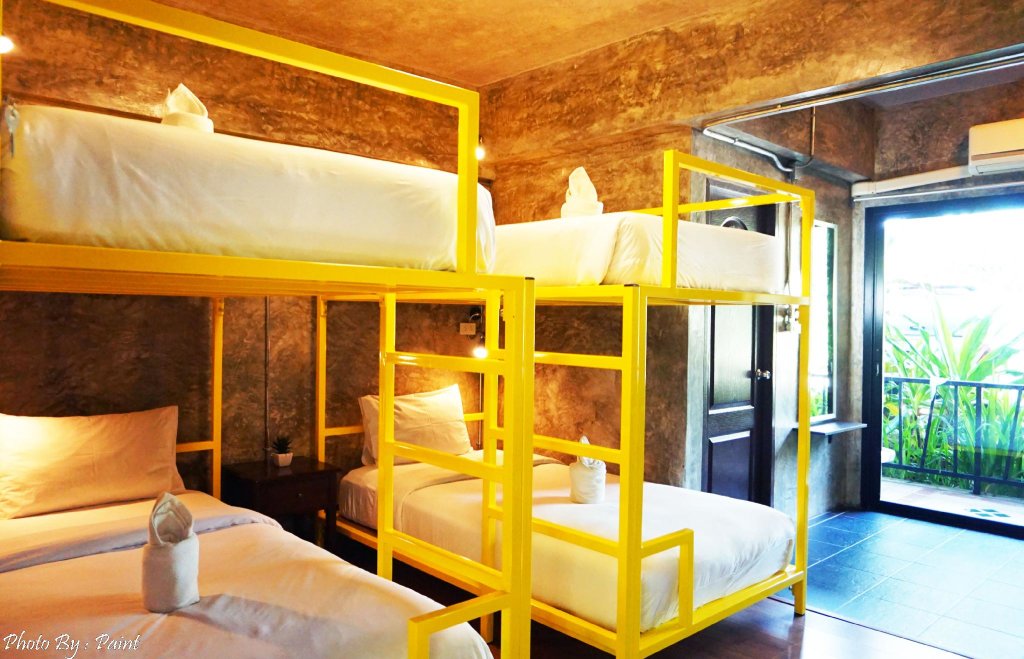 Кровать в общем номере Baan Suan Ramita Resort