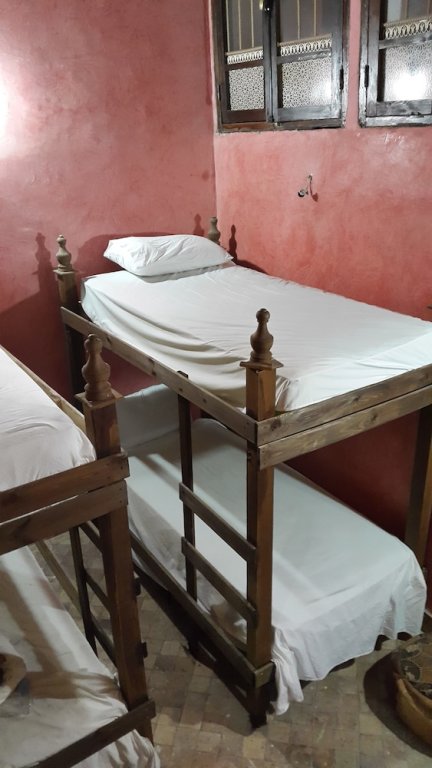 Кровать в общем номере с видом на город Dar Naima