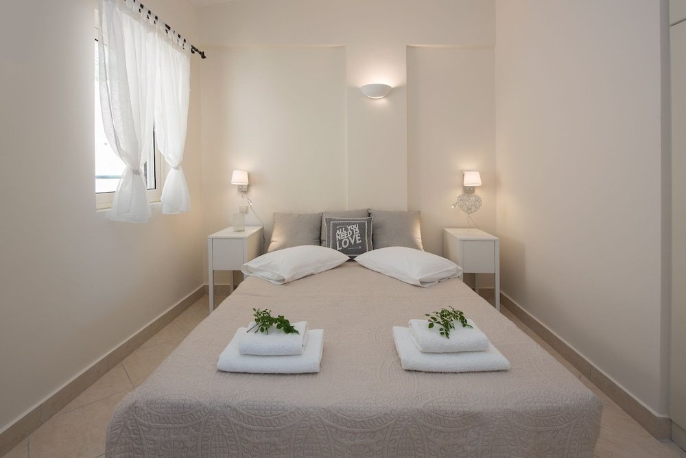 Apartamento cuádruple Superior con balcón y con vista al mar Glyfada Corfu Houses