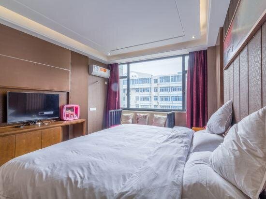 Cama en dormitorio compartido Wan Yun Hotel