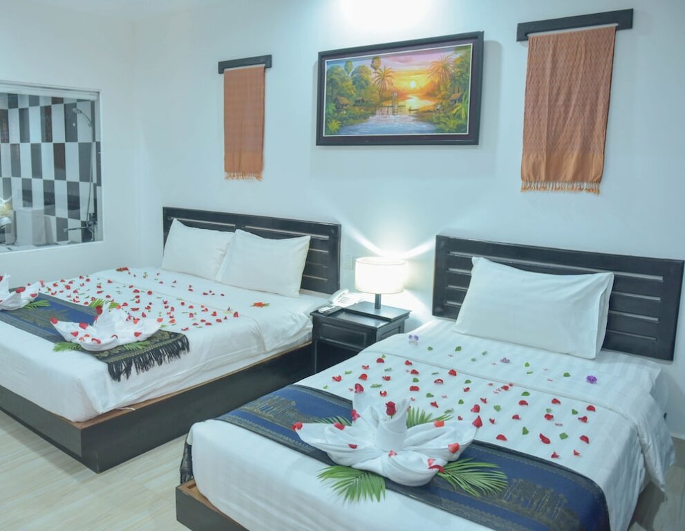 Deluxe Family room with balcony Dinata Angkor Boutique Hotel