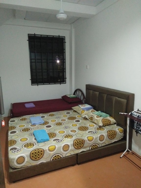 Économie triple chambre Diyana Budget Hotel - Hostel