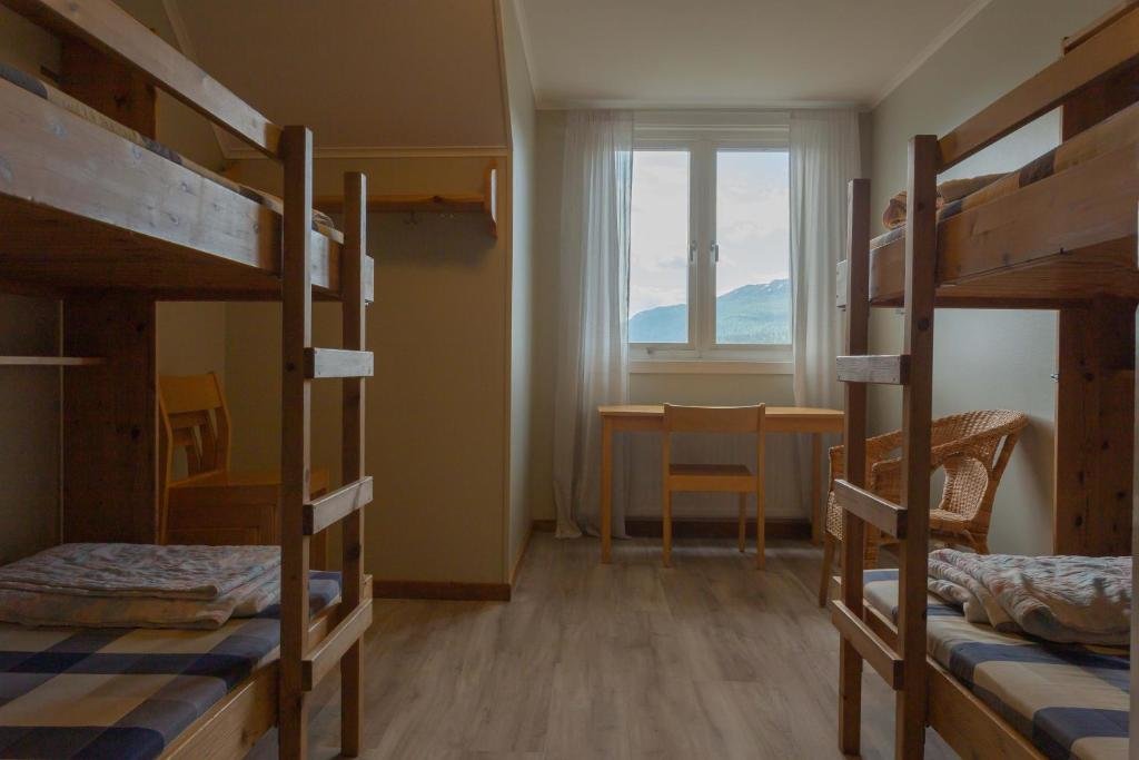 Кровать в общем номере Ammarnäs Wärdshus