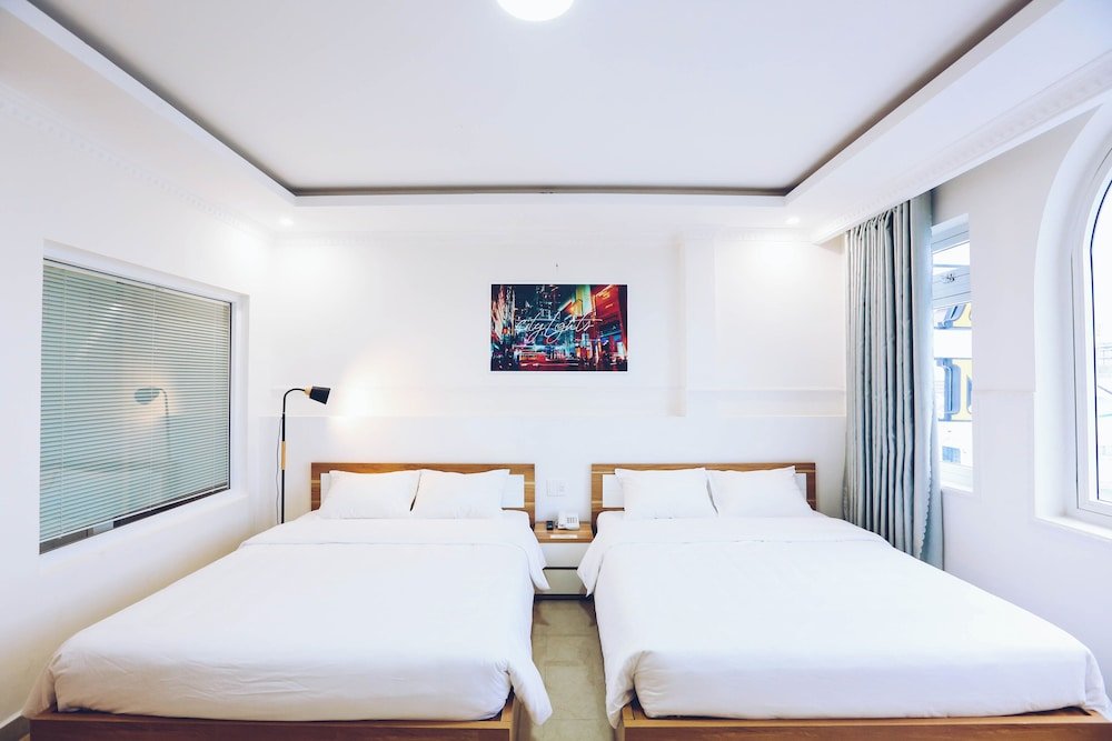 Четырёхместный номер Deluxe TTR An Nam Apart Hotel