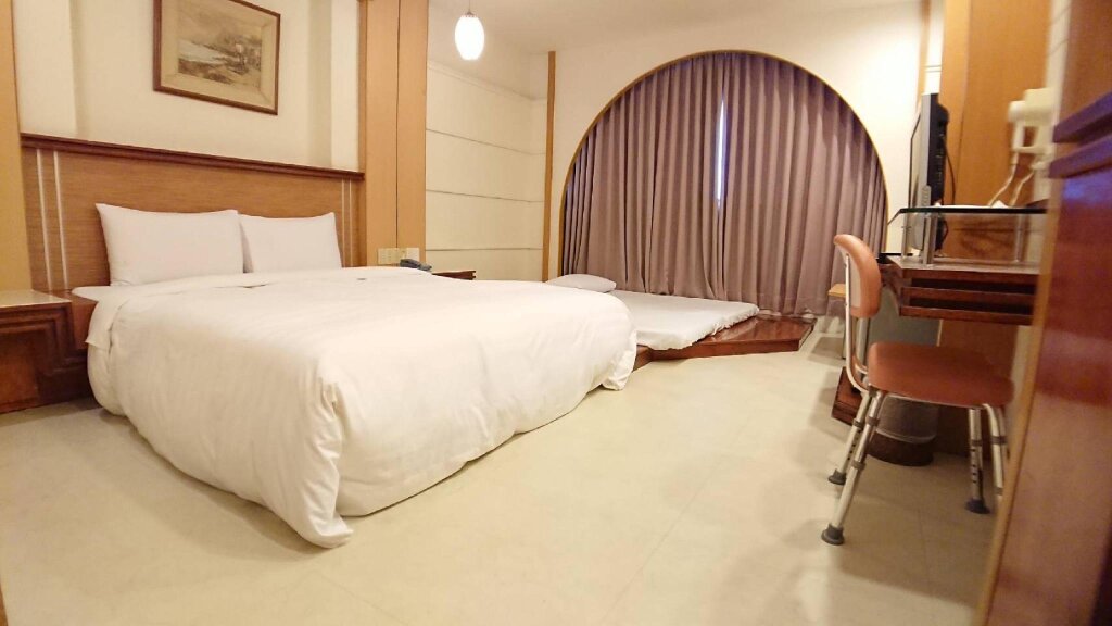 Standard Quadruple room Hwa Nan Hotel