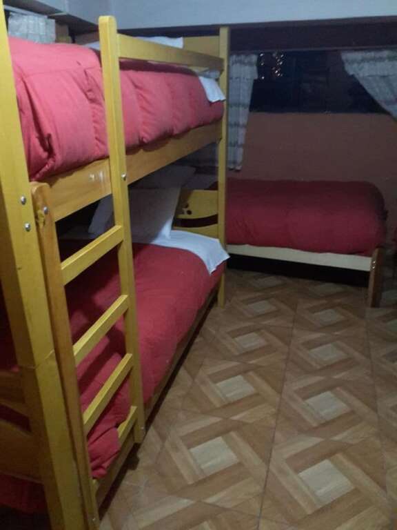 Кровать в общем номере Parwa Hostel