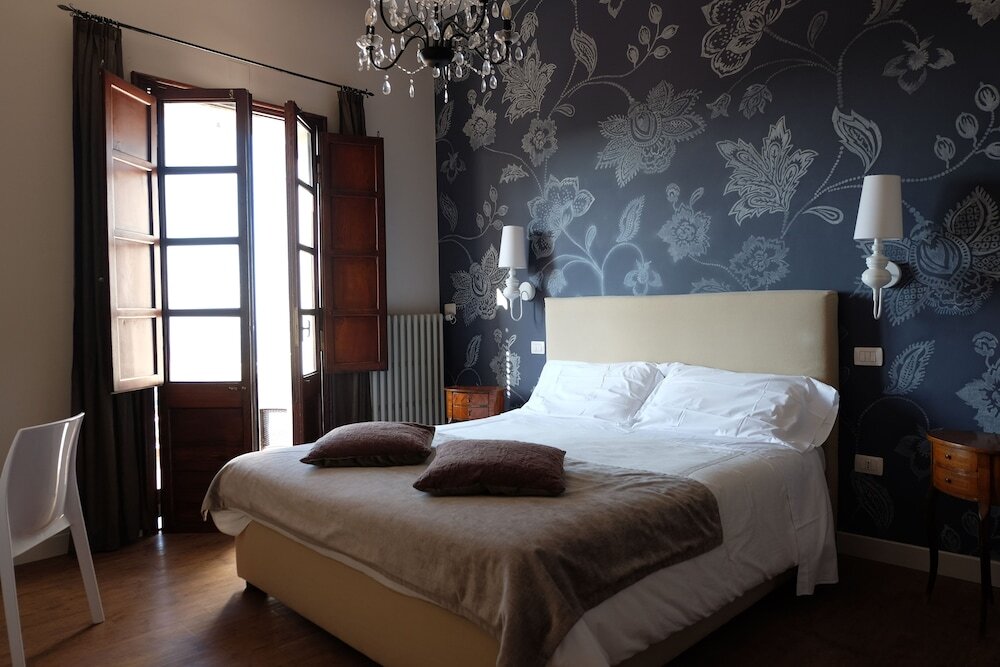 Двухместный номер Deluxe c 1 комнатой с балконом и с видом на сад La Rocca Guest House & Spa
