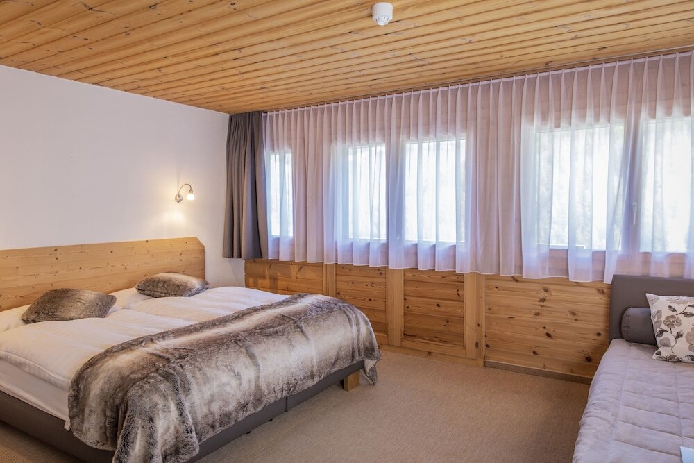 Habitación doble familiar Estándar con balcón Hôtel Alpina - Swiss Ski & Bike Lodge Grimentz