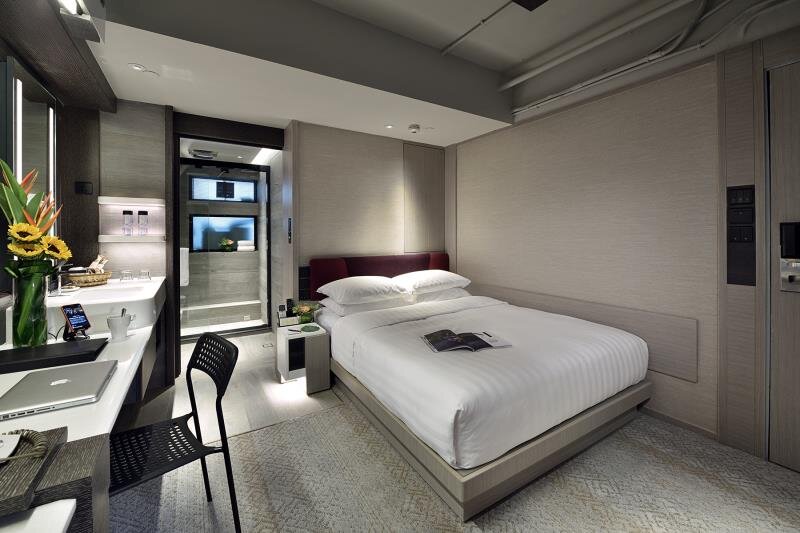Cama en dormitorio compartido Xi Hotel