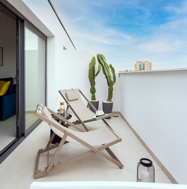 Habitación De lujo 2 dormitorios ático con balcón y con vista a la ciudad Caleyro Boutique Apartments - Parking incluido