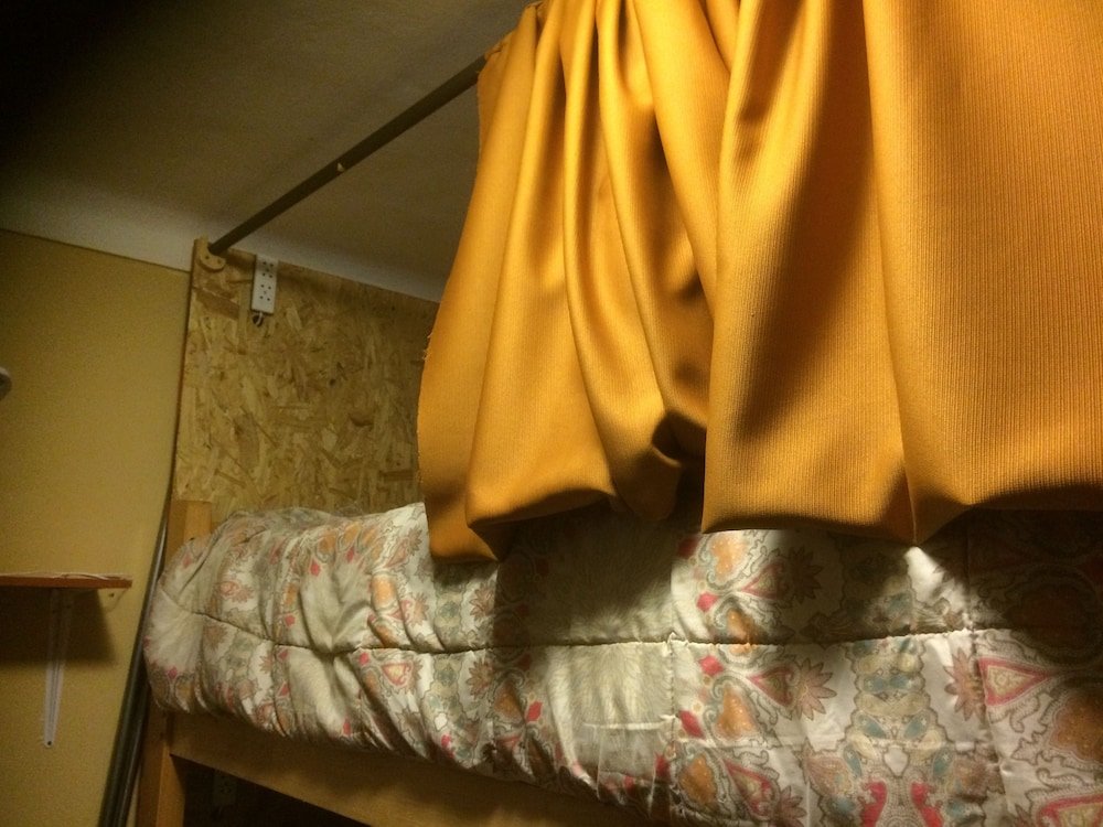 Кровать в общем номере Intihuatana Hostel