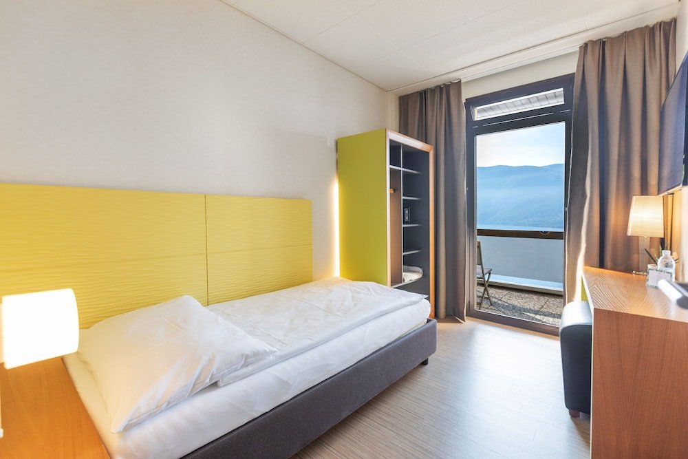 Одноместный номер Comfort с балконом и с видом на озеро Parkhotel Brenscino Brissago