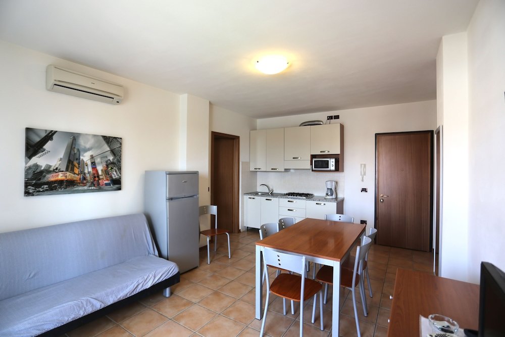 Апартаменты Comfort Villaggio Pini