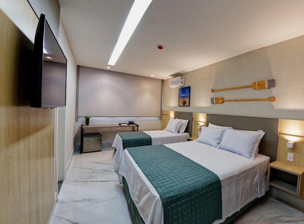 Кровать в общем номере Gaeta Hotel
