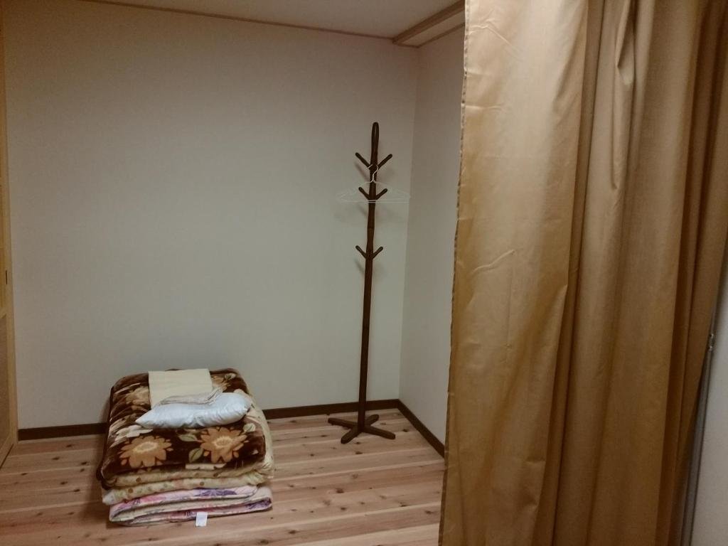 Cama en dormitorio compartido (dormitorio compartido masculino) Marugame Guest house Wellkame