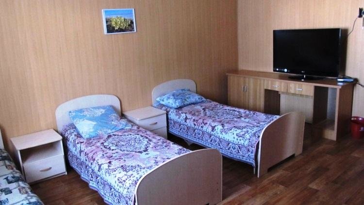 Кровать в общем номере Gostevoj dom Severnyj