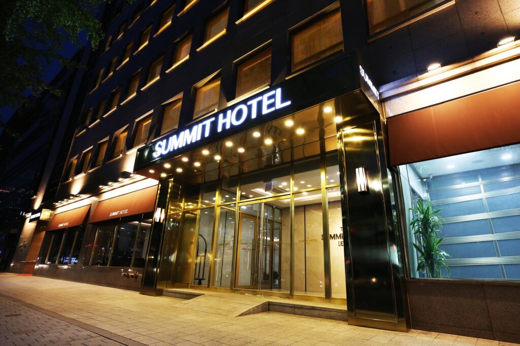 Кровать в общем номере Summit Hotel Dongdaemun