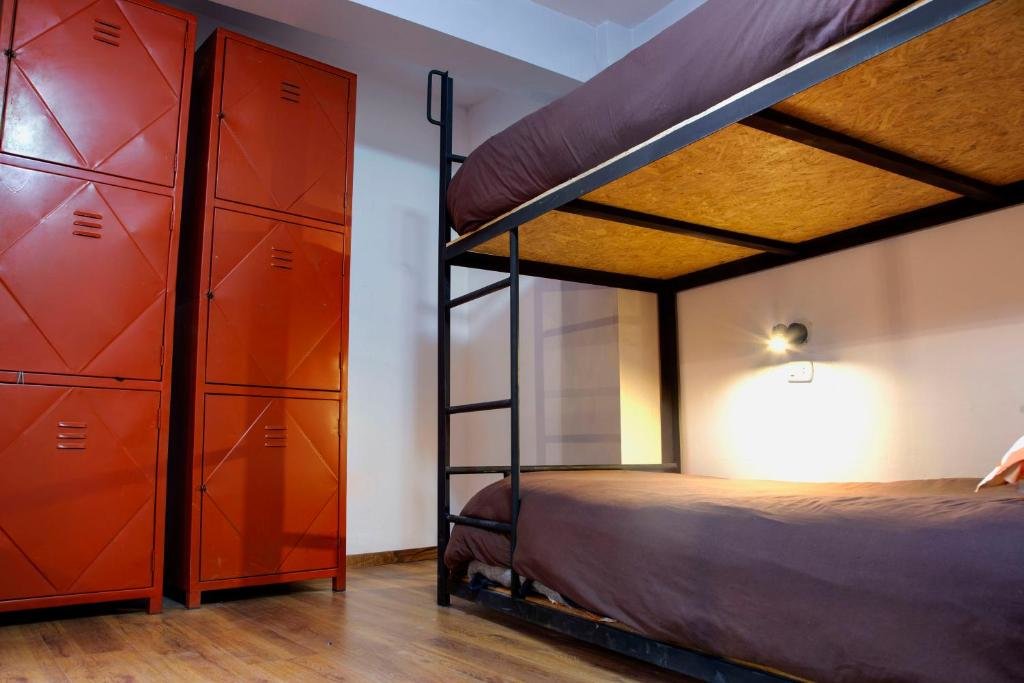 Кровать в общем номере Magic Packer Hostel