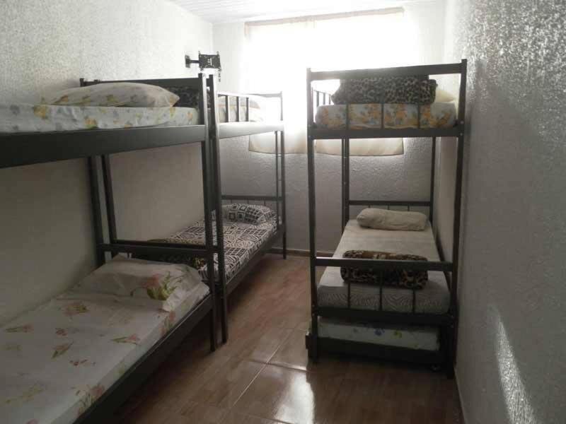 Кровать в общем номере (мужской номер) Hostel Horizonte de Minas
