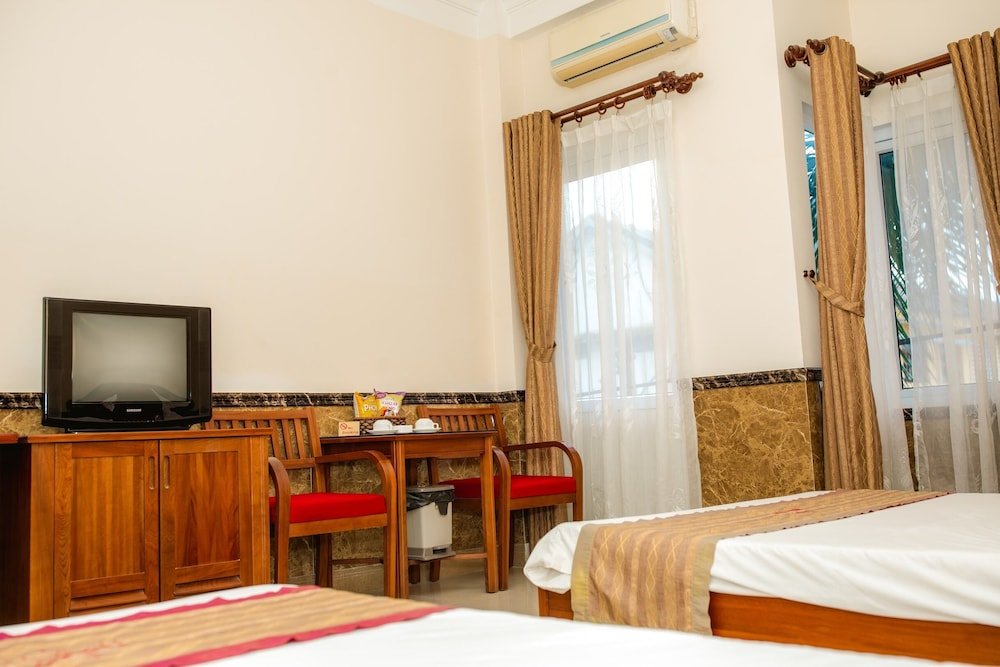 Standard famille chambre avec balcon Hoang Van Hotel