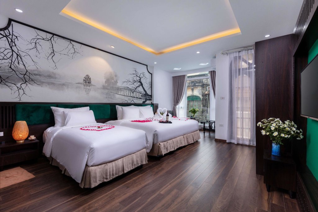 Camera familiare Standard con balcone Hanoi Center Silk Lullaby Hotel and Travel