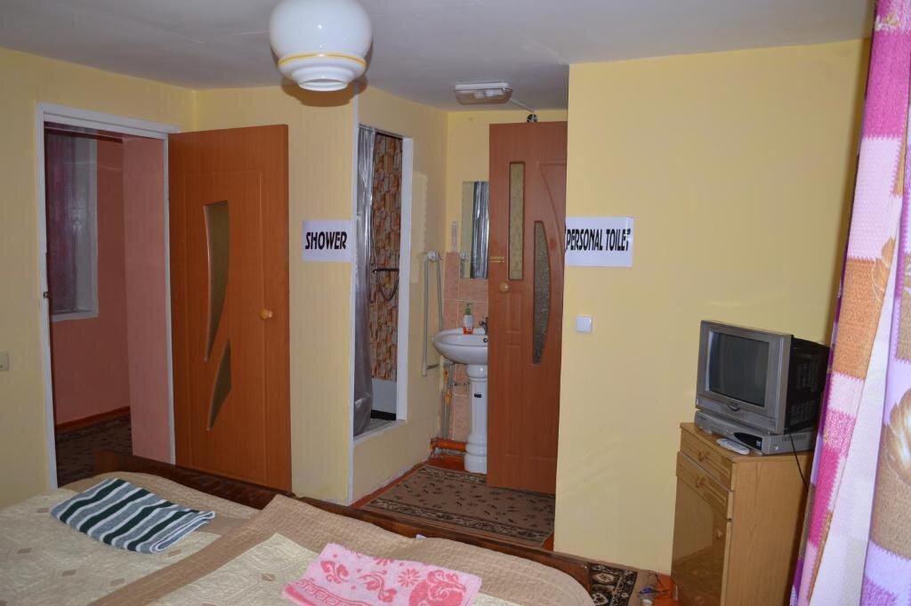 Habitación cuádruple Estándar Guest House on Derbisheva