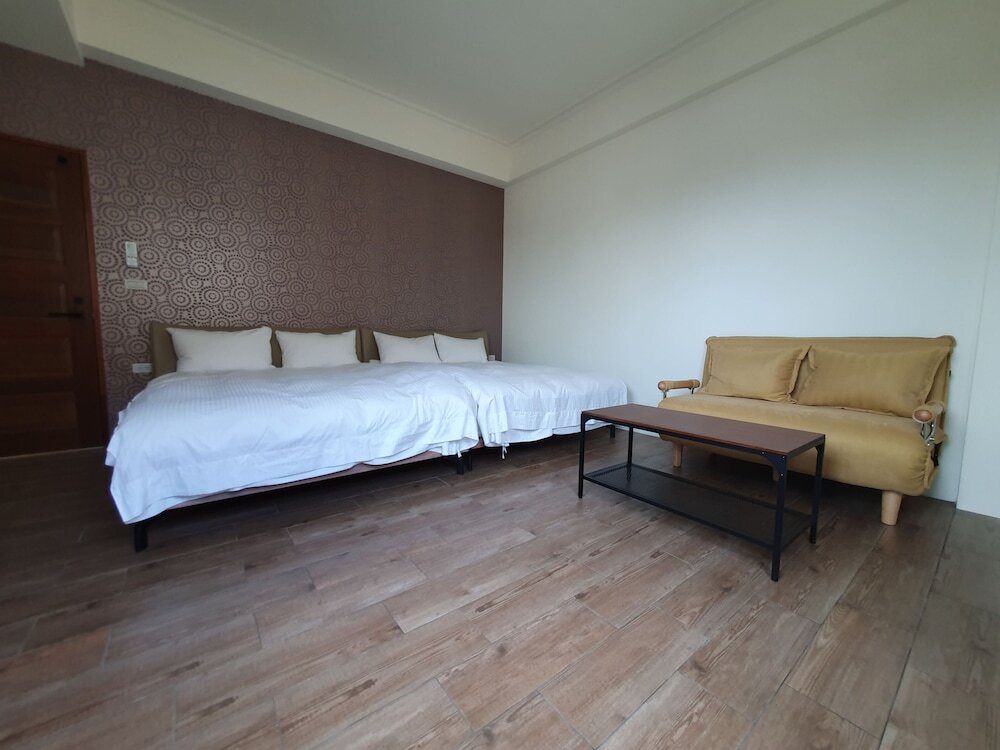 Habitación cuádruple familiar Estándar Xin Qun Style Hostel
