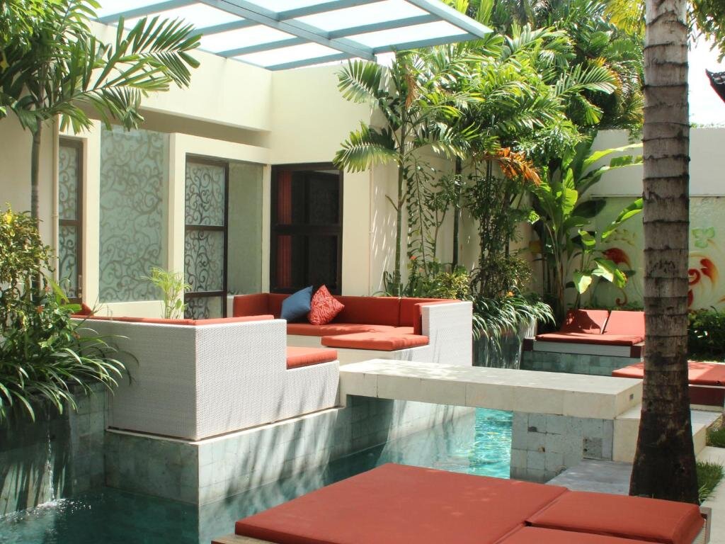 Suite 1 camera da letto con vista sulla piscina Bali Ginger Suites & Villa